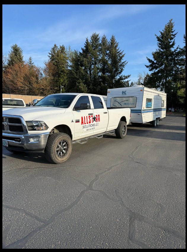 Travel trailer towed out of a property