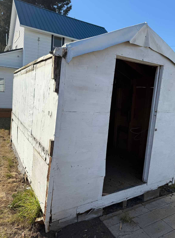 Backyard shed prepped for demolition