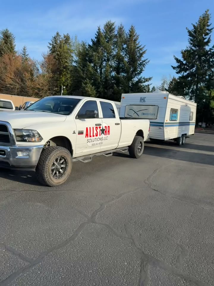 Travel trailer towed out for disposal